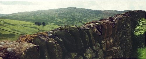 Stone walls lining the country road leading over the mountain pass to Ambleside.