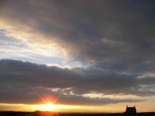 Sunset over Beachcomber Campsite, Goswick Sands, Berwick upon Tweed.