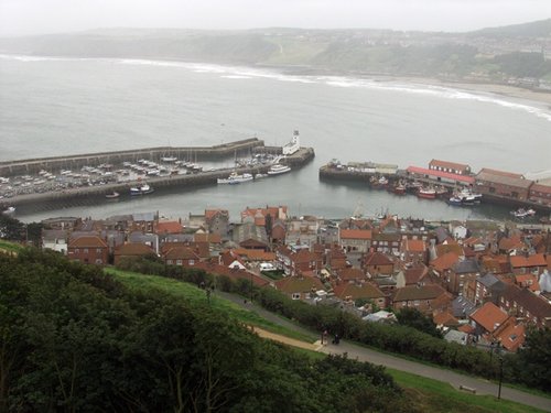 Scarborough, North Yorkshire. Old Harbour in mist from castle