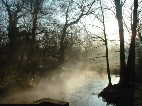 Cassiobury Park, Watford. The sun warms the waters