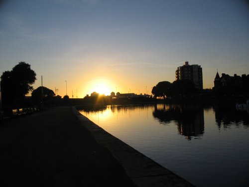 Sun setting over Canoe Lake, Southsea