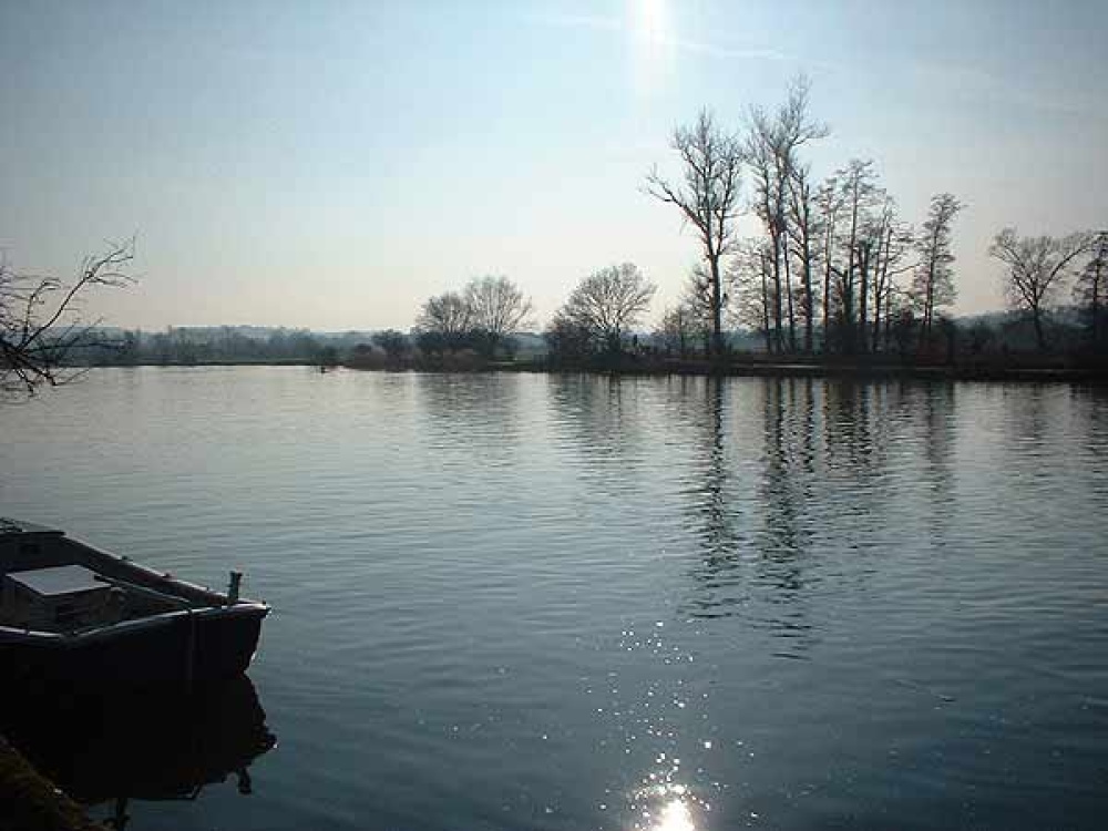 The sun setting over the River Thames at bisham