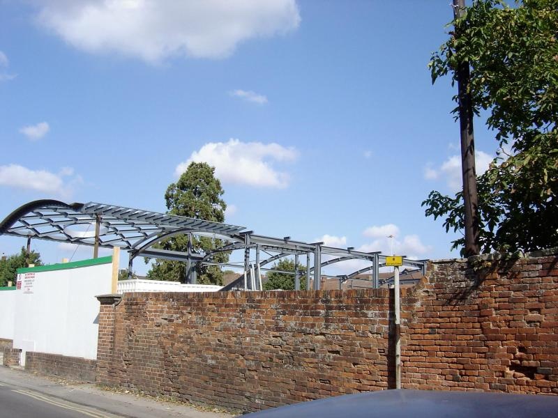 New police station & old brick wall (bricks would have been made in trowbridge brickyard)