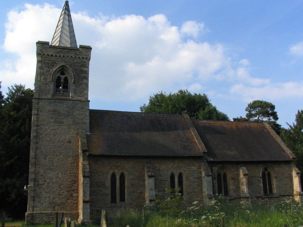 Photograph of St Cuthburt's Parish Church. Tower is of Norman vintage, late 12th century.