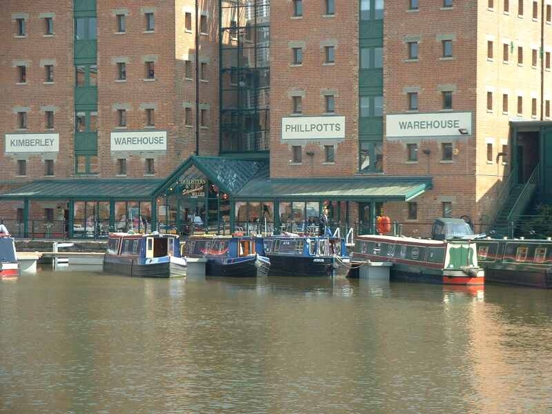 Narrow boats moored up at Gloucester docks.