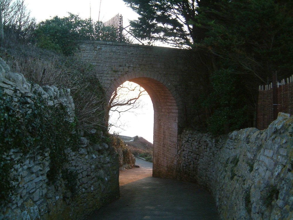 Historic arch below Rufus Castle overlooking Church Ope Cove, Portland, Dorset