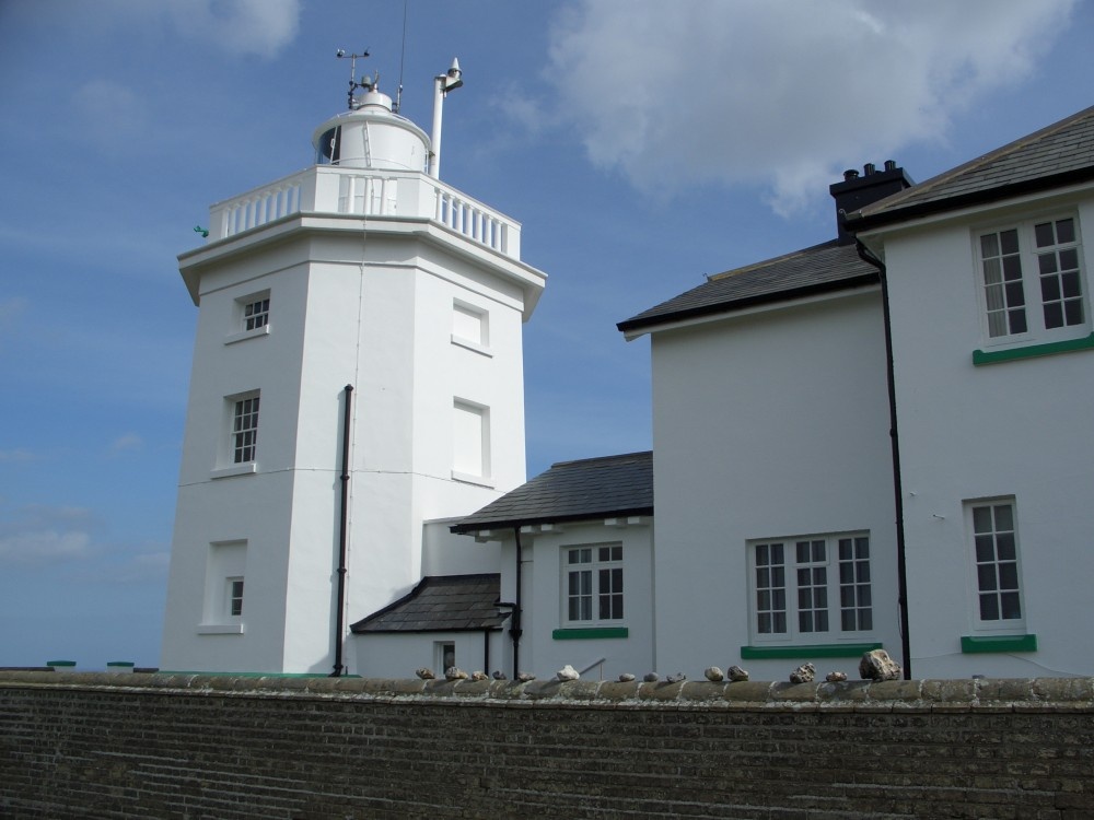 Cromer Lighthouse and cottage photo by Nik Forster