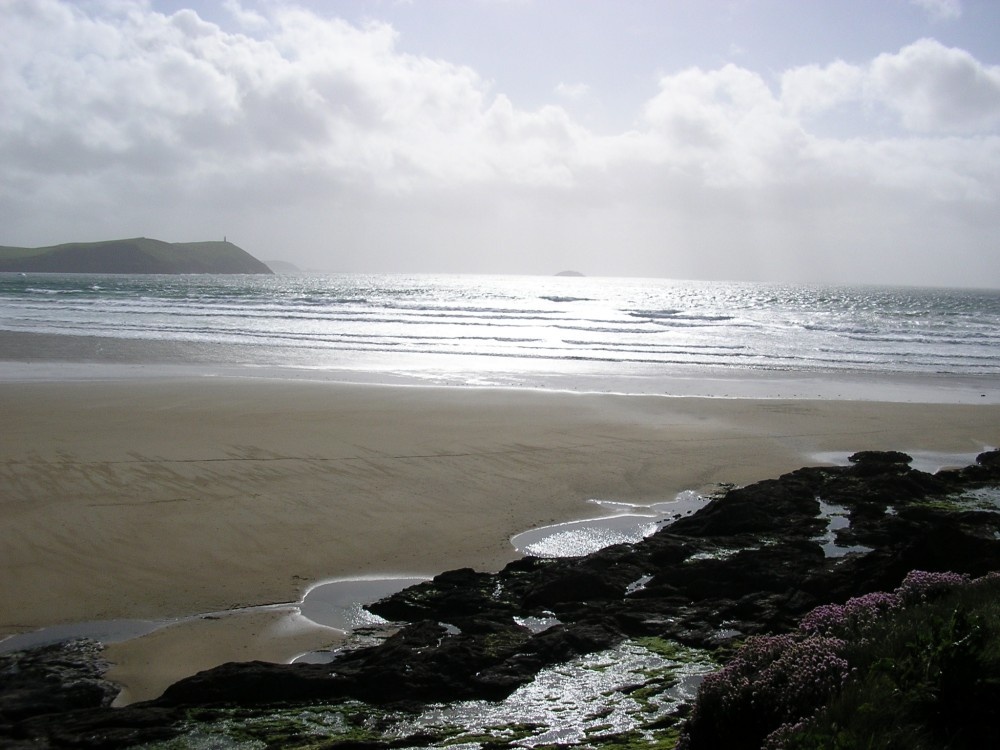 Photograph of Bay at New Polzeath in early evening. Walk left on Beach for just yards to Polzeath.