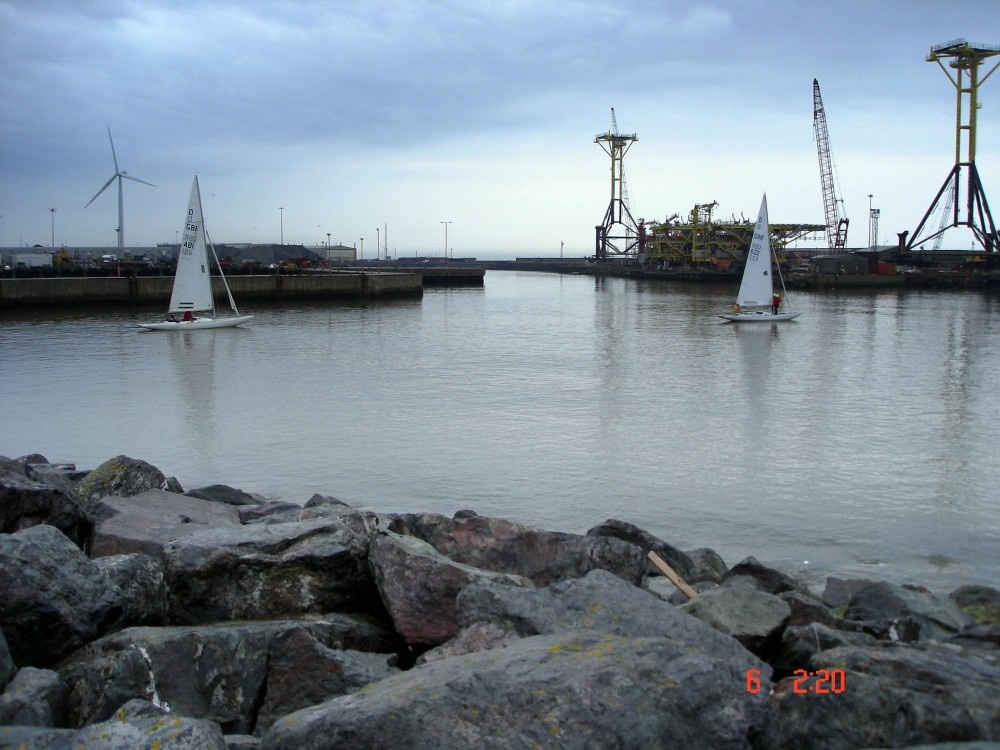 Boats entering into sea..