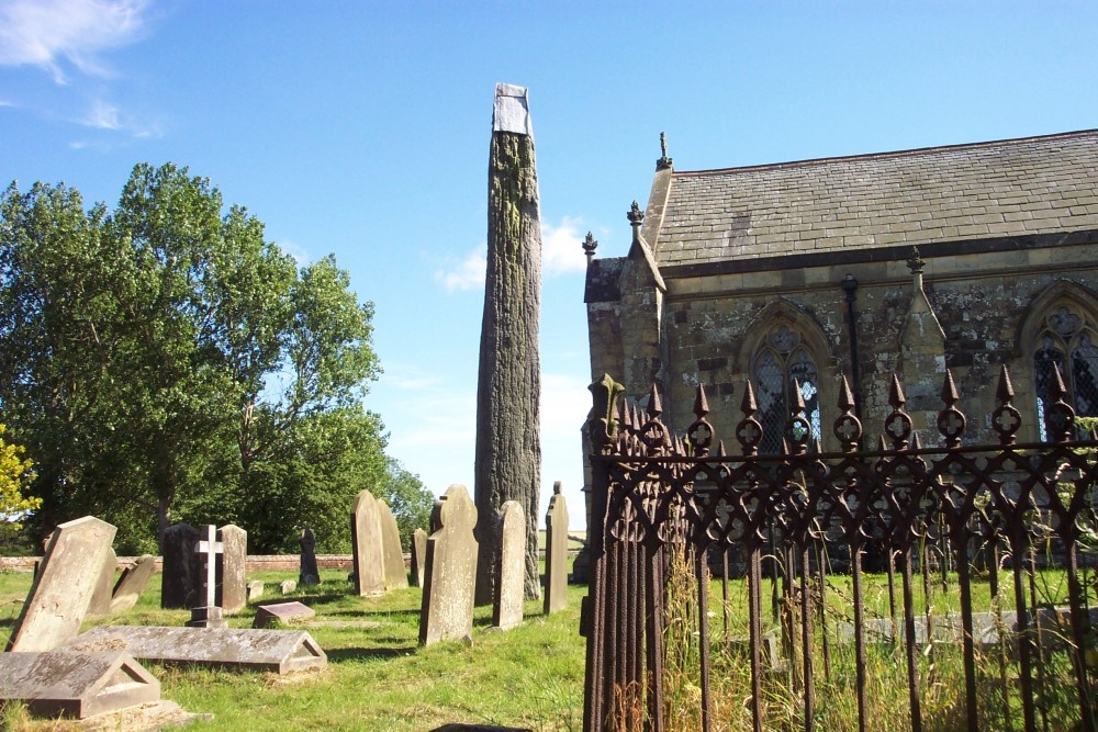 Photograph of Standing stone at Rudston, in the grounds of All Saints church