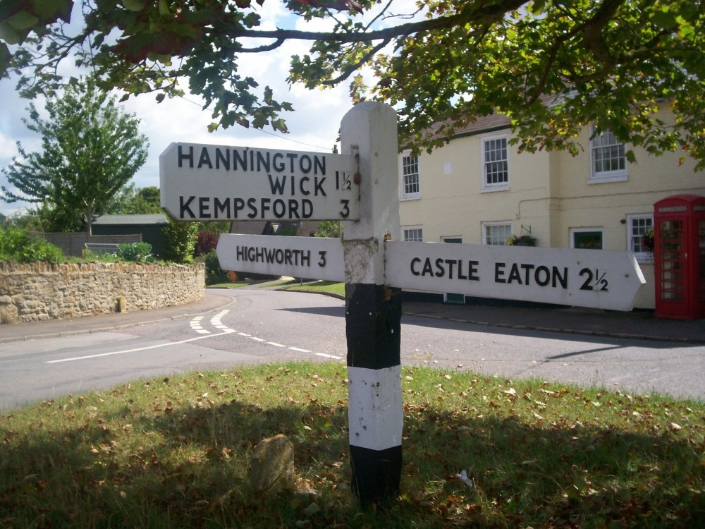 Sylvan scene at a road junction in Hannington, a village within the borough of Swindon