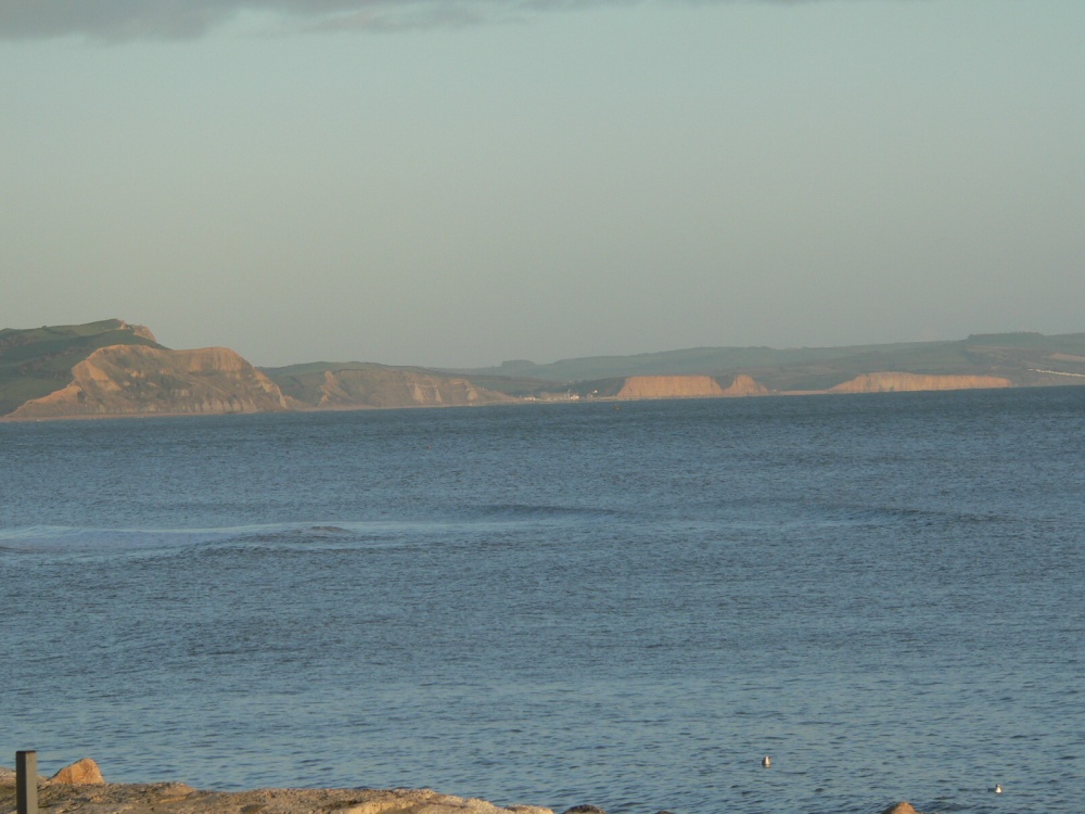 Looking across to West Bay from Lyme Regis, Dorset.