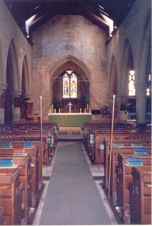 Leckhampton Church in Leckhampton, Gloucestershire. A view of the altar.