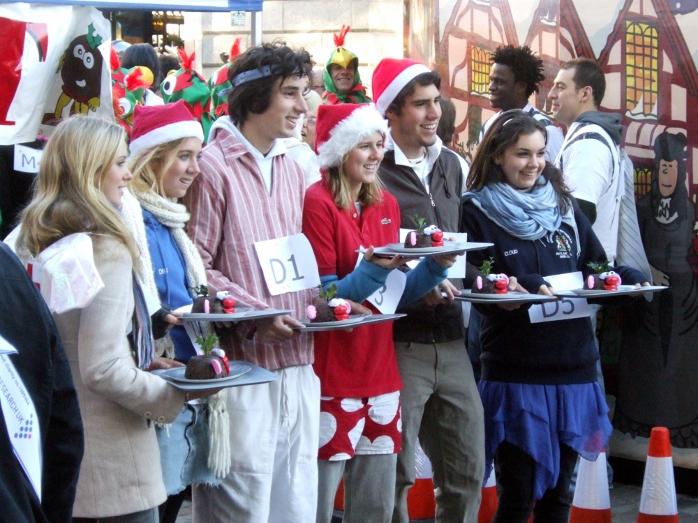 Preparing for the Great Christmas Pudding Race at Covent Garden, Greater London.