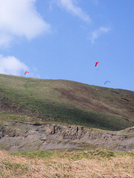 Flyers on a sunny day coming off Mam Tor