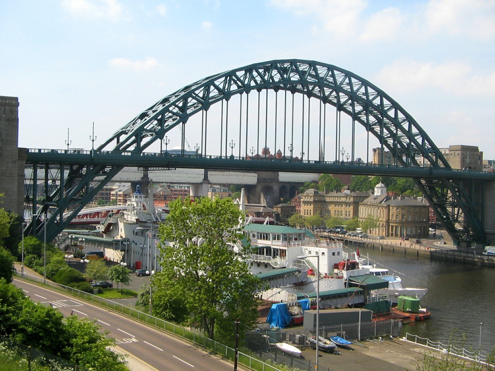 The Tyne Bridge with the floating Night Club below.