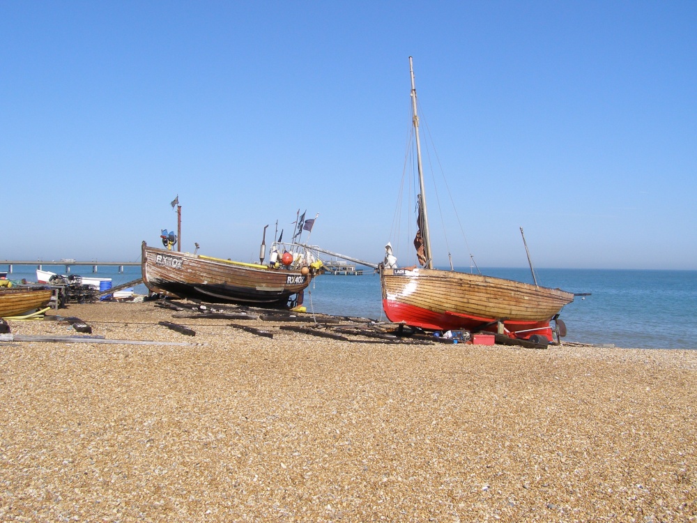 Photograph of Boats on the beach.