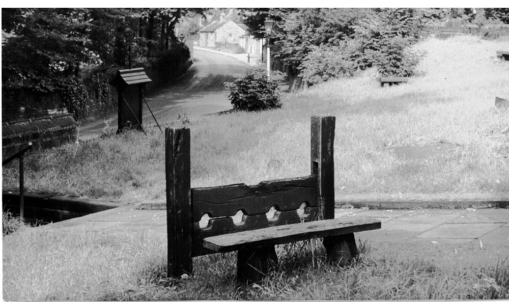 Photograph of Rawdon Churchyard stocks circa 1940