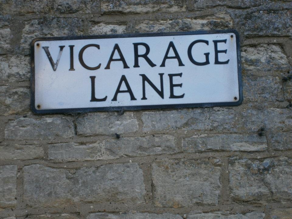 PODINGTON VILLAGE SIGN