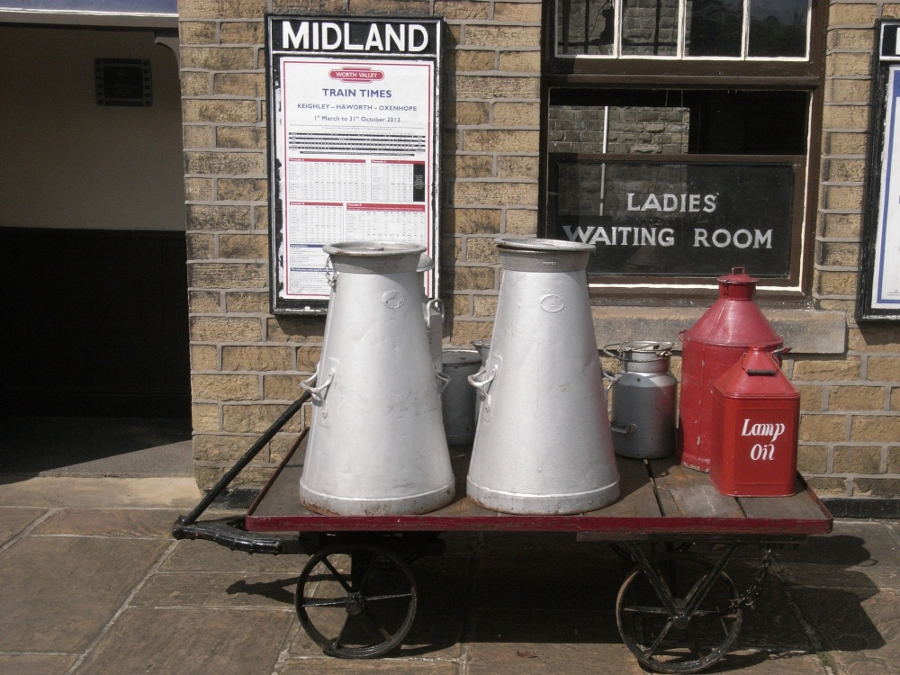 Photograph of Old churns on Oxenhope Station