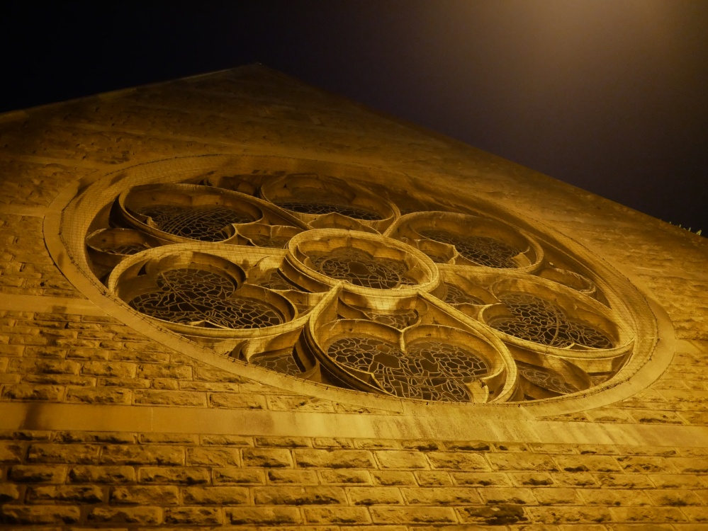 St, John the Evangelist stained glass window at night, Bath