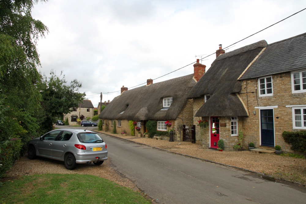 Photograph of Pretty thatched cottages in Main Street, Fringford