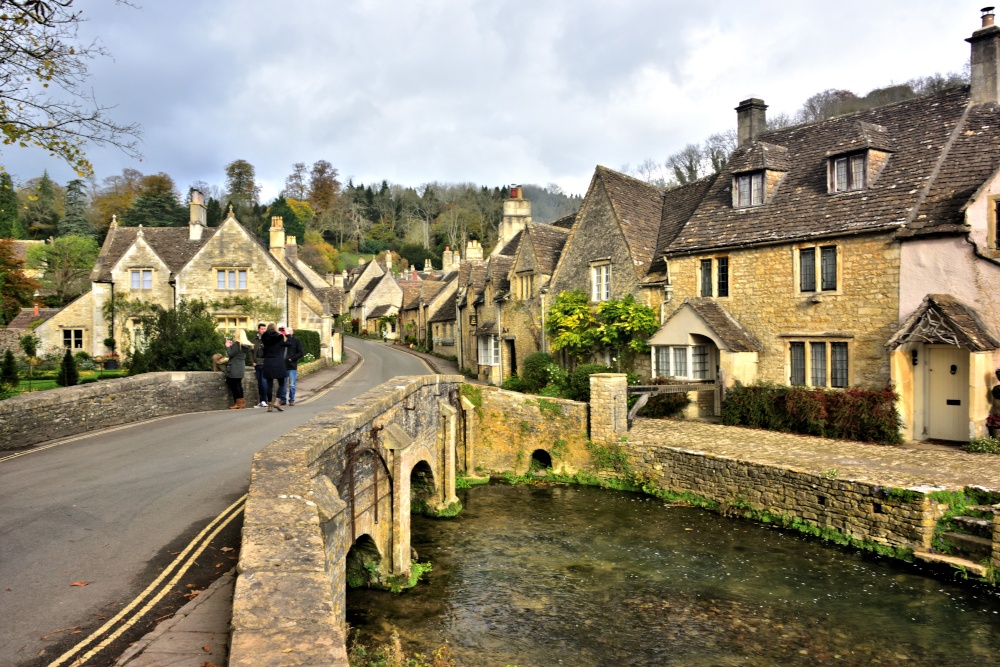 View Up The Street from the Bridge Over By Brook in Castle Combe