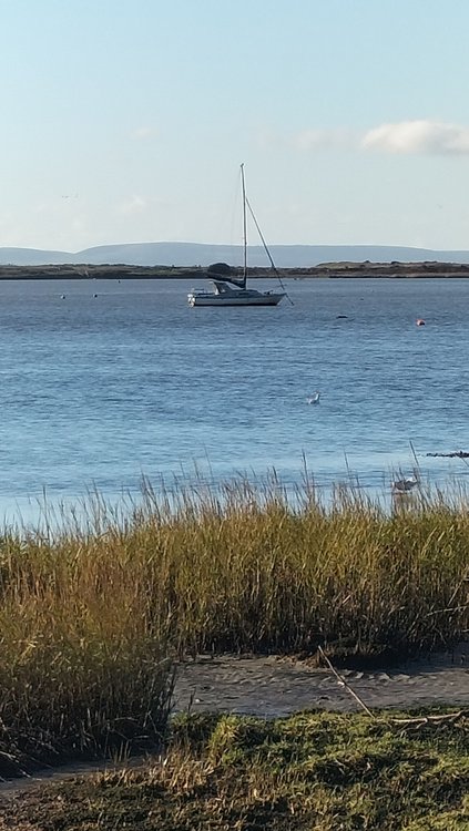 Boat in Christchurch Harbour from Mudeford Quay