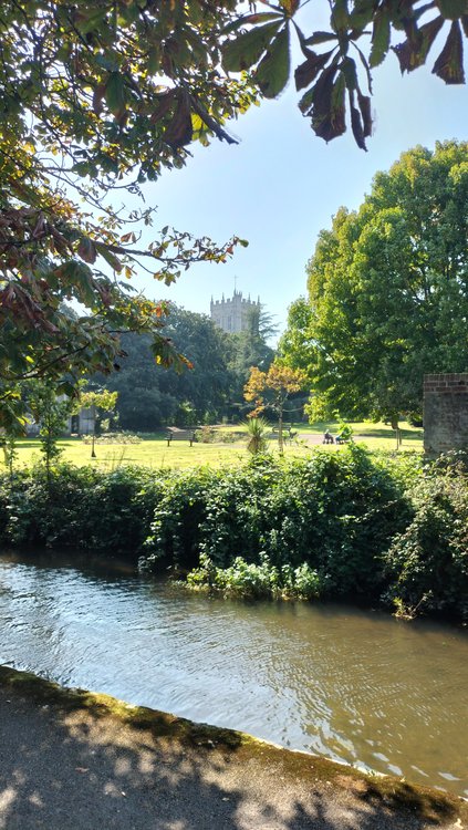 Looking towards the Priory church tower from Convent Walk in Christchurch